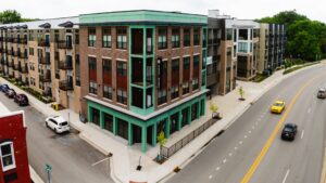 East bank development mixed-use residential and commercial building on the white river in downtown noblesville.