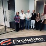 A photo of a few members of the evolution motion solutions tam with members of the ned team and common council.